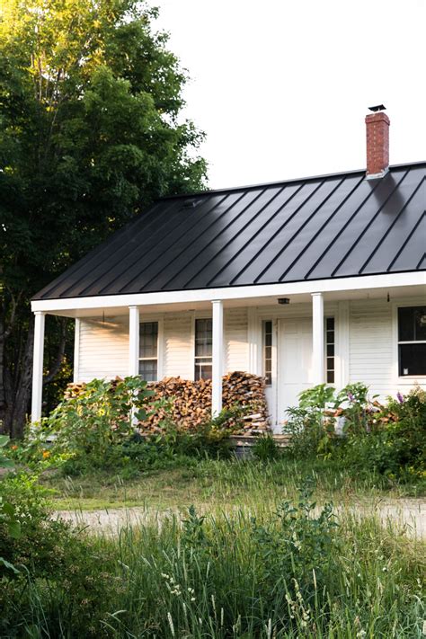 pic of white ranch house w/ maroon metal roof|white metal roof exterior homes.